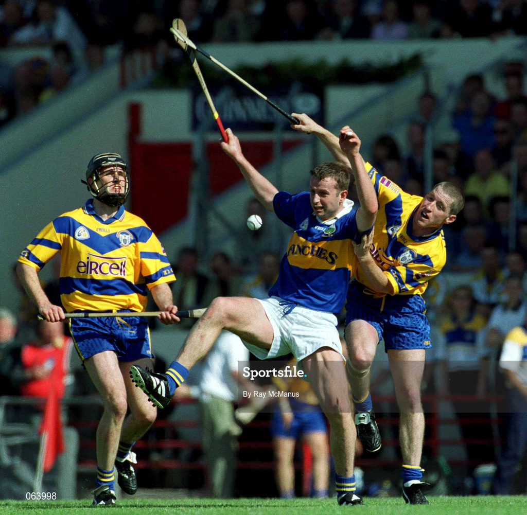 3 June 2001; Brian O'Meara of Tipperary in action against David Hoey of Clare during the Guinness Munster Senior Hurling Championship Semi-Final match between Tipperary and Clare at Páirc Uí Chaoimh in Cork. Photo by Ray McManus/Sportsfile