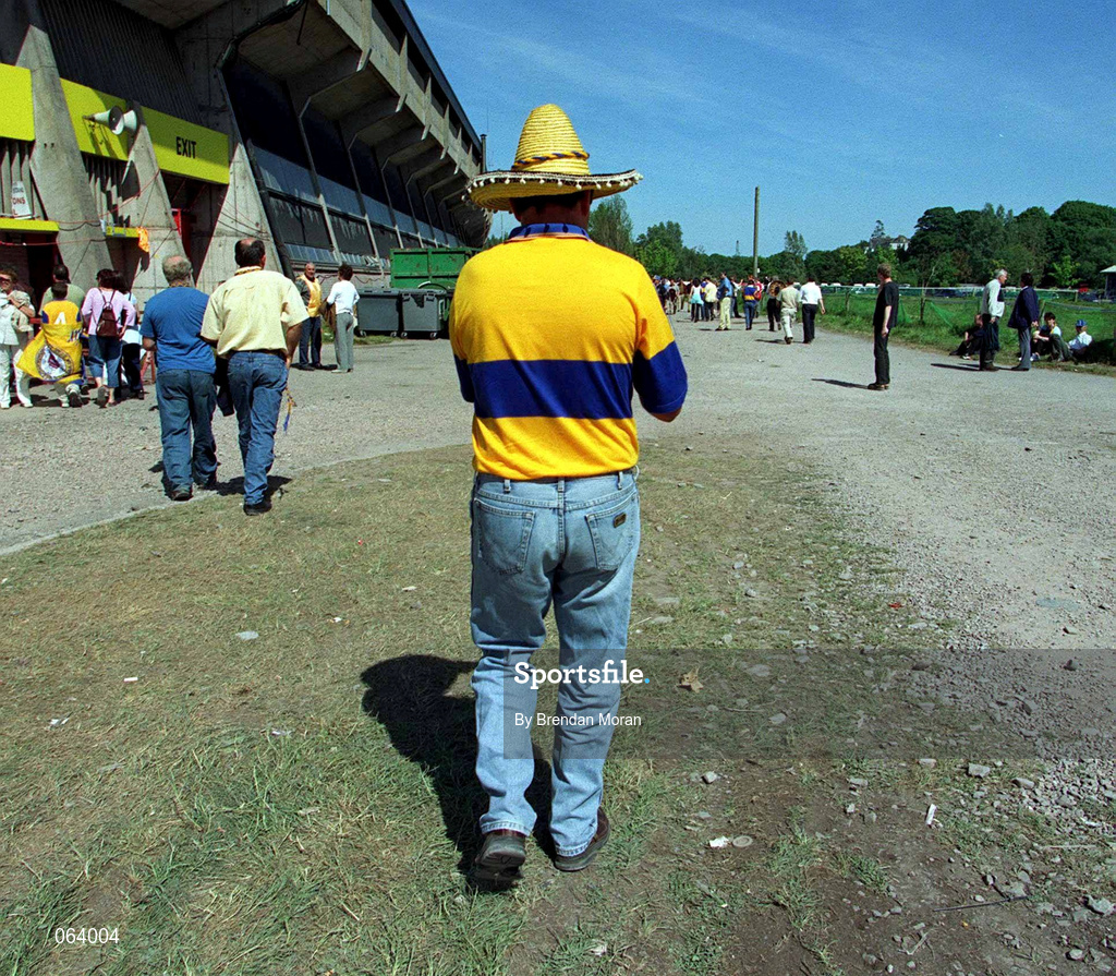 3 June 2001; A Clare supporter makes his way into the stadium ahead of the Guinness Munster Senior Hurling Championship Semi-Final match between Tipperary and Clare at Páirc Uí Chaoimh in Cork. Photo by Brendan Moran/Sportsfile