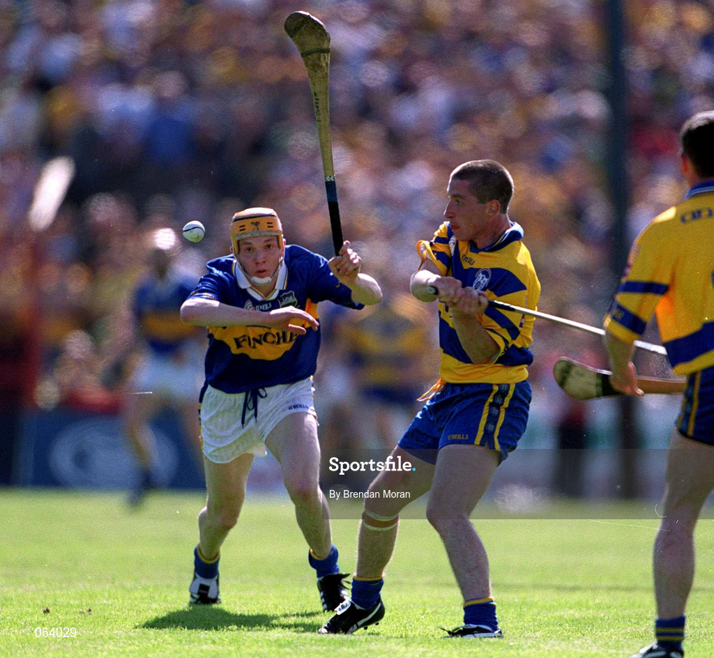 3 June 2001; David Hoey of Clare is tackled by Lar Corbett of Tipperary during the Guinness Munster Senior Hurling Championship Semi-Final match between Tipperary and Clare at Páirc Uí Chaoimh in Cork. Photo by Brendan Moran/Sportsfile