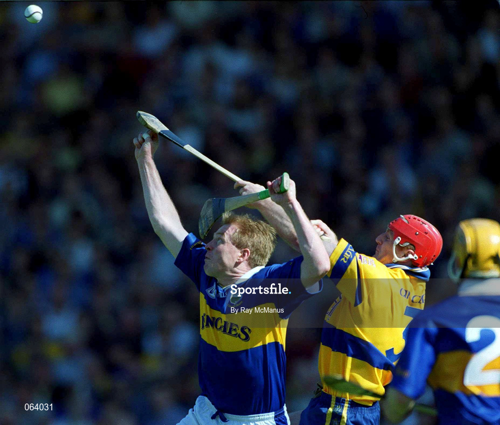3 June 2001; Declan Ryan of Tipperary in action against Brian Lohan of Clare during the Guinness Munster Senior Hurling Championship Semi-Final match between Tipperary and Clare at Páirc Uí Chaoimh in Cork. Photo by Ray McManus/Sportsfile