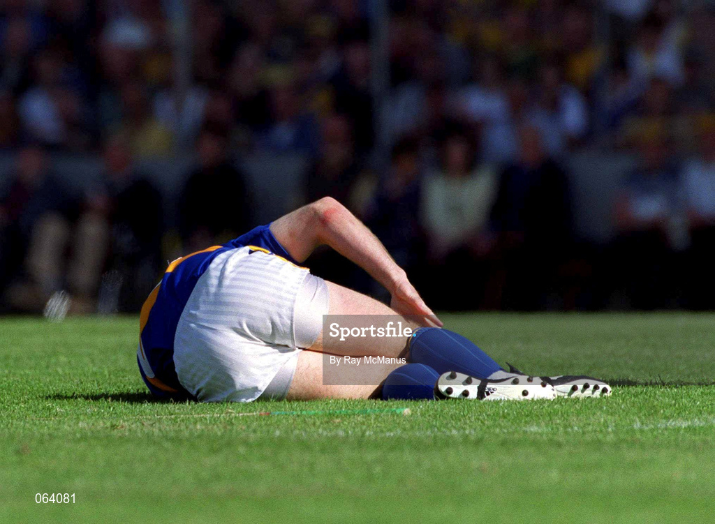 3 June 2001; John Leahy of Tipperary lays injured with a knee injury during the Guinness Munster Senior Hurling Championship Semi-Final match between Tipperary and Clare at Páirc Uí Chaoimh in Cork. Photo by Ray McManus/Sportsfile