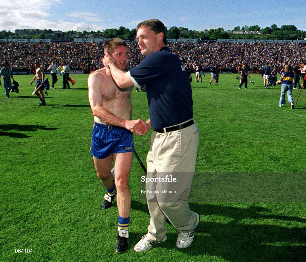 3 June 2001; Tipperary manager Nicky English consoles James O'Connor of Clare following the Guinness Munster Senior Hurling Championship Semi-Final match between Tipperary and Clare at Páirc Uí Chaoimh in Cork. Photo by Brendan Moran/Sportsfile