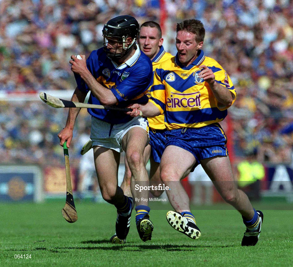 3 June 2001; Thomas Dunne of Tipperary in action against James O'Connor of Clare during the Guinness Munster Senior Hurling Championship Semi-Final match between Tipperary and Clare at Páirc Uí Chaoimh in Cork. Photo by Ray McManus/Sportsfile