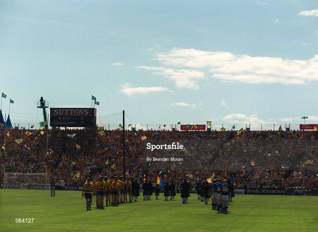 3 June 2001; Players of both sides during the pre-match parade ahead of the Guinness Munster Senior Hurling Championship Semi-Final match between Tipperary and Clare at Páirc Uí Chaoimh in Cork. Photo by Brendan Moran/Sportsfile