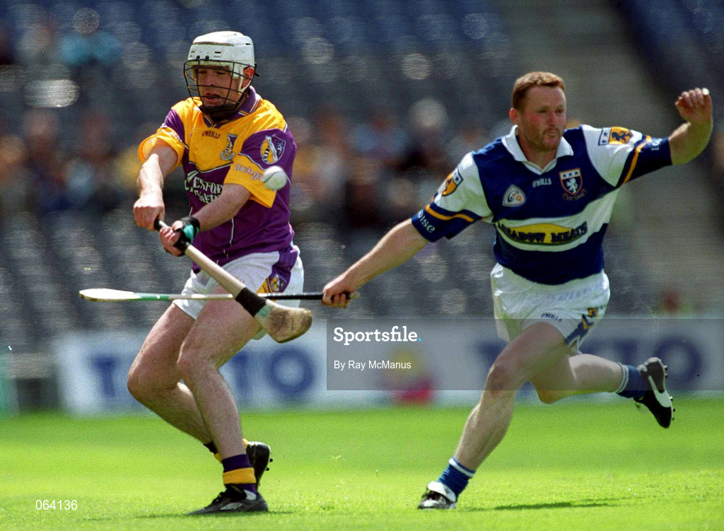10 June 2001; Paul Codd of Wexford in action against Des Killeen of Laois during the Guinness Leinster Senior Hurling Championship Semi-Final match between Wexford and Laois at Croke Park in Dublin. Photo by Ray McManus/Sportsfile
