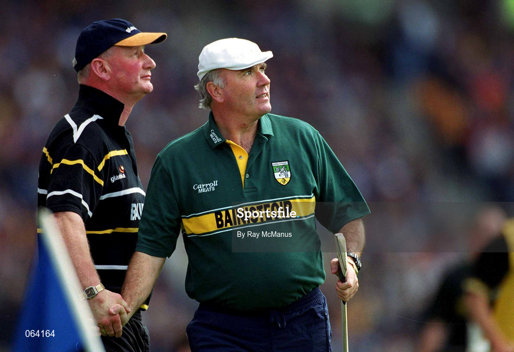 10 June 2001; Offaly manager Michael Bond, right and Kilkenny manager Brian Cody shake hands, as they watch the game, during the Guinness Leinster Senior Hurling Championship Semi-Final match between Kilkenny and Offaly at Croke Park in Dublin. Photo by Ray McManus/Sportsfile
