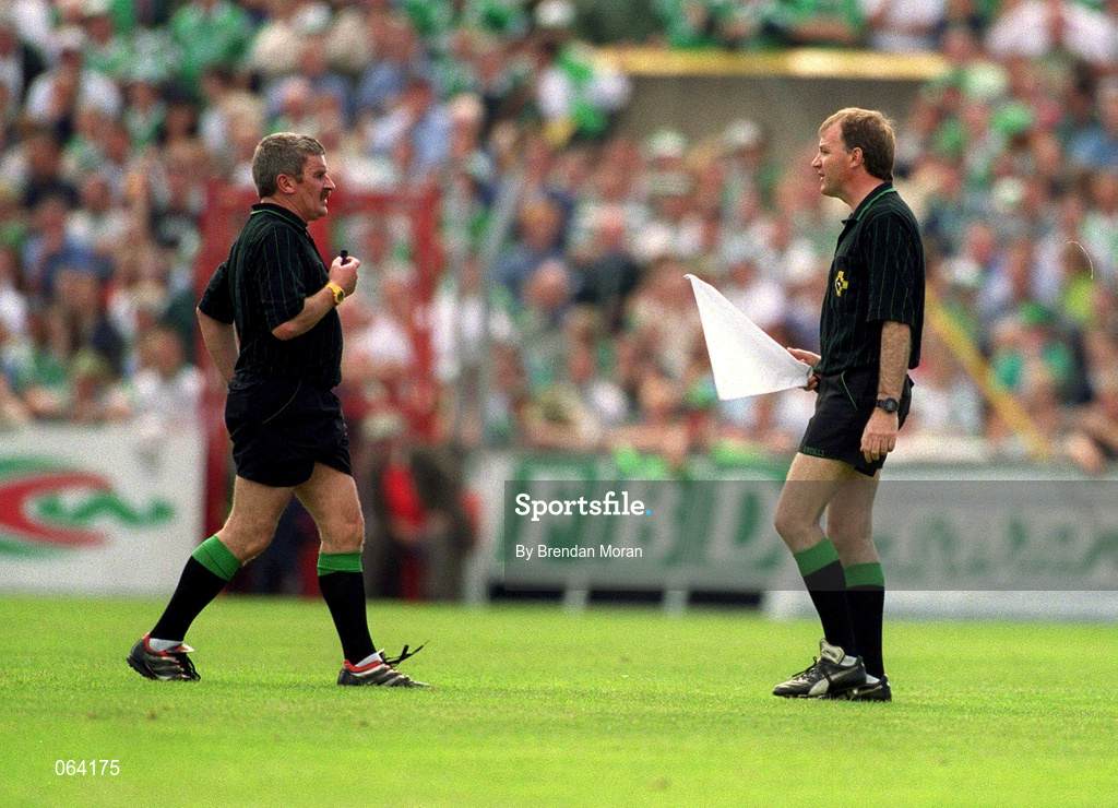 10 June 2001; Referee Pat Horan, left, in conversation with linesman Dickie Murphy during the Guinness Munster Senior Hurling Championship Semi-Final match between Limerick and Waterford at Páirc Uí Chaoimh in Cork. Photo by Brendan Moran/Sportsfile