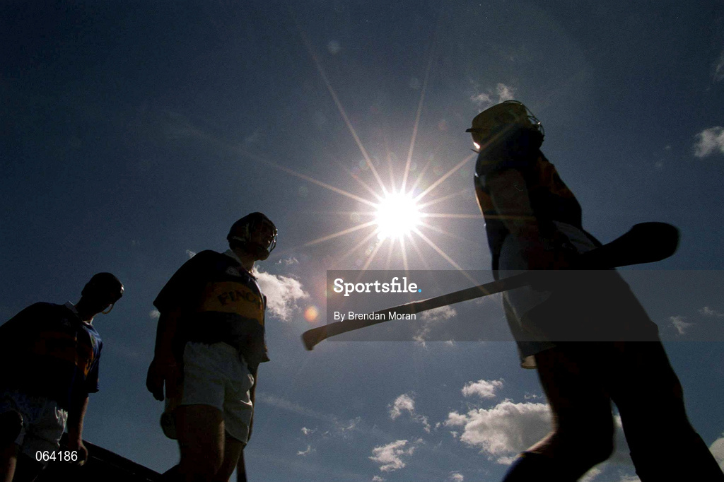 3 June 2001; Tipperary hurlers Eamonn Corcoran, right, Paul Kelly, centre, and Conor Gleeson during the pre-match parade ahead of the Guinness Munster Senior Hurling Championship Semi-Final match between Tipperary and Clare at Páirc Uí Chaoimh in Cork. Photo by Brendan Moran/Sportsfile