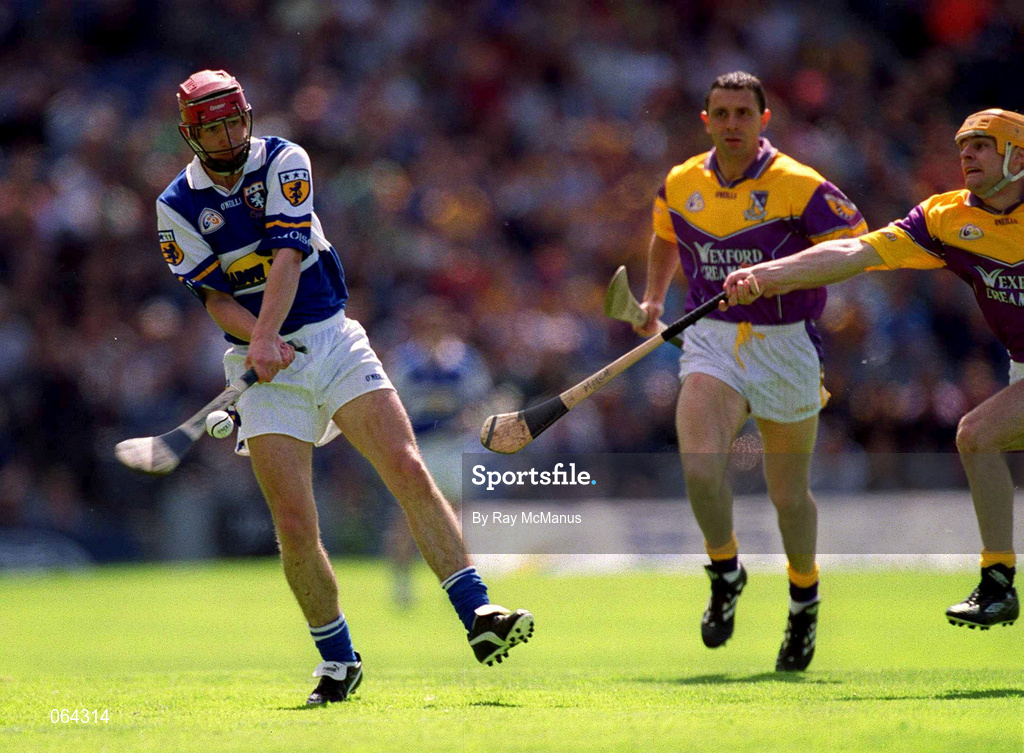 10 June 2001; Joe Phelan of Laois in action against Michael Jordan and Larry O'Gorman of Wexford during the Guinness Leinster Senior Hurling Championship Semi-Final match between Wexford and Laois at Croke Park in Dublin. Photo by Ray McManus/Sportsfile
