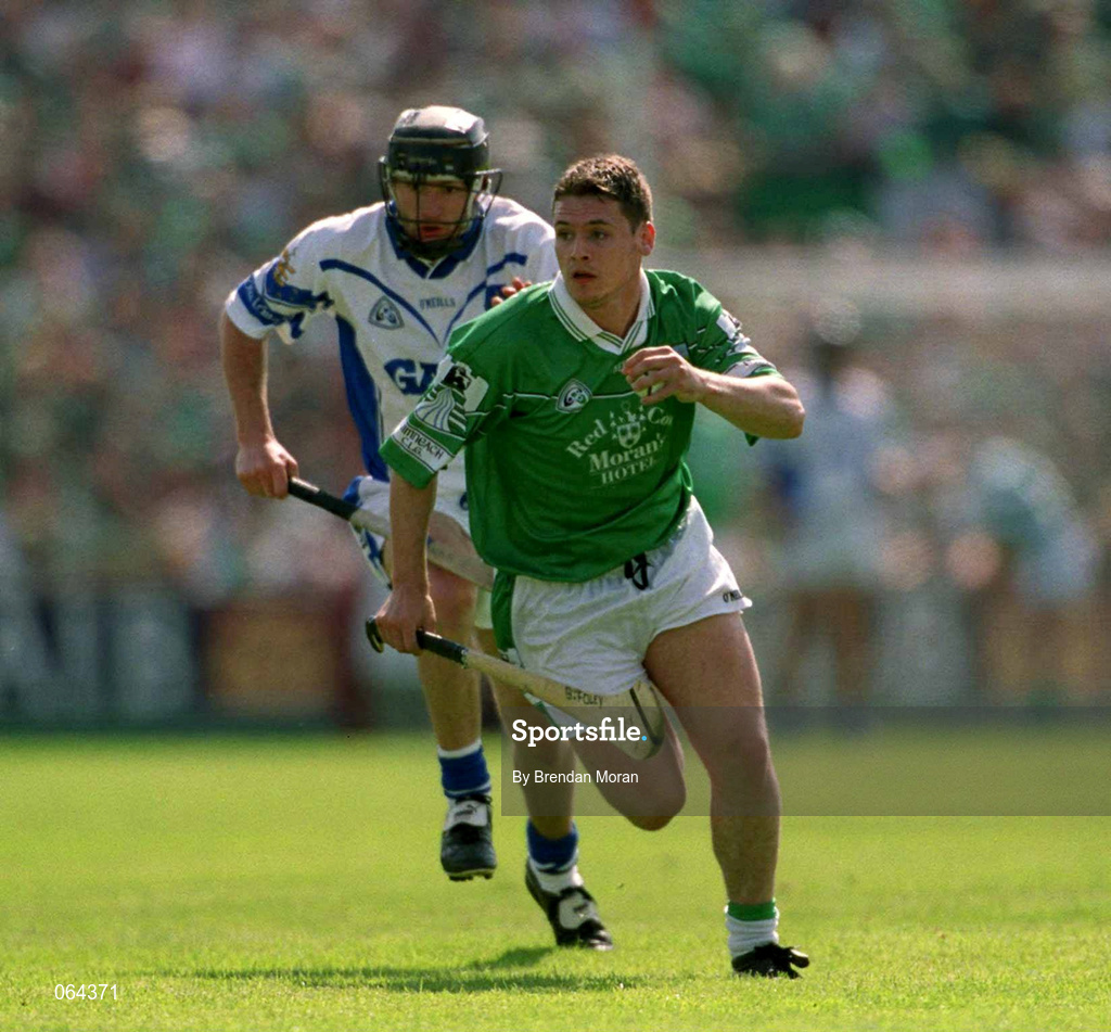 10 June 2001; Barry Foley of Limerick in action against James Murray of Waterford during the Guinness Munster Senior Hurling Championship Semi-Final match between Limerick and Waterford at Páirc Uí Chaoimh in Cork. Photo by Brendan Moran/Sportsfile