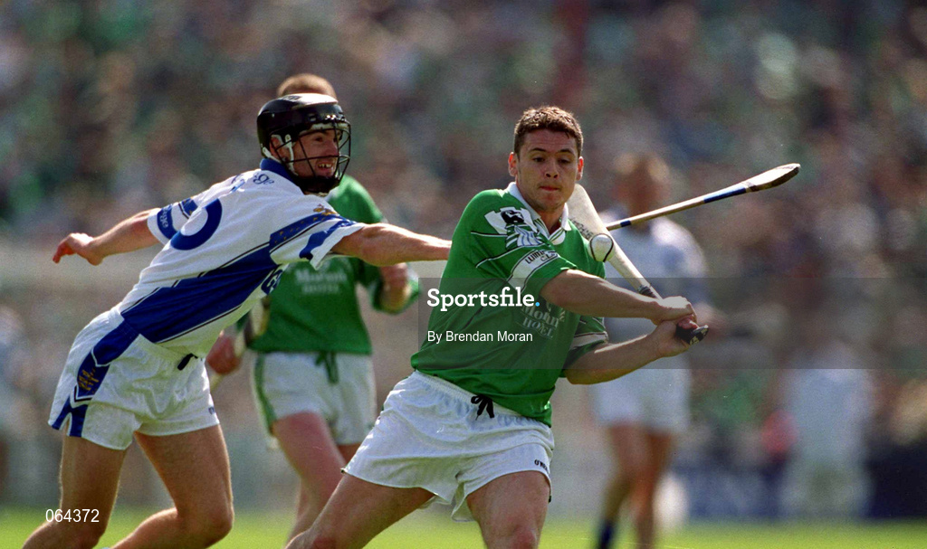 10 June 2001; Barry Foley of Limerick in action against James Murray of Waterford during the Guinness Munster Senior Hurling Championship Semi-Final match between Limerick and Waterford at Páirc Uí Chaoimh in Cork. Photo by Brendan Moran/Sportsfile