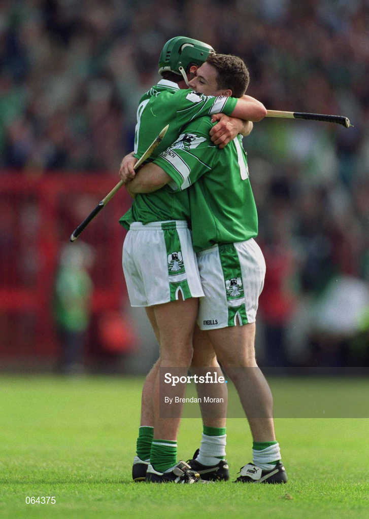 10 June 2001; Barry Foley of Limerick, right, celebrates with team-mate Mike O'Brien at the final whistle of the Guinness Munster Senior Hurling Championship Semi-Final match between Limerick and Waterford at Páirc Uí Chaoimh in Cork. Photo by Brendan Moran/Sportsfile
