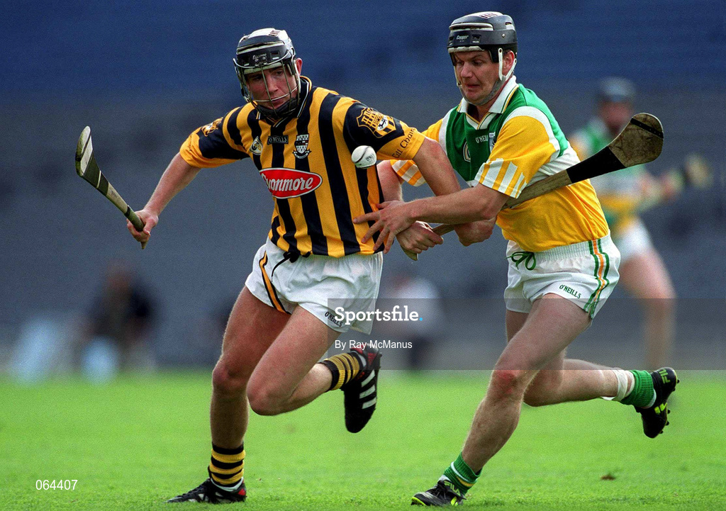 10 June 2001; Eddie Brennan of Kilkenny in action against Hubert Rigney of Offaly during the Guinness Leinster Senior Hurling Championship Semi-Final match between Kilkenny and Offaly at Croke Park in Dublin. Photo by Ray McManus/Sportsfile
