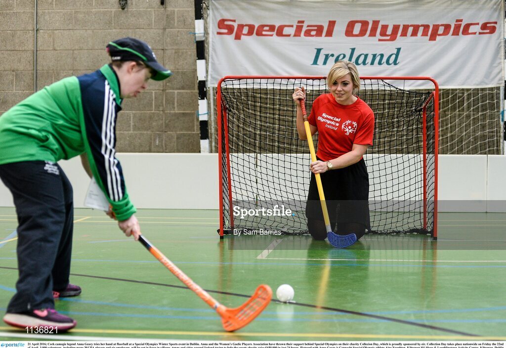 21 April 2016; Cork camogie legend Anna Geary tries her hand at floorball at a Special Olympics Winter Sports event in Dublin. Anna and the Women’s Gaelic Players Association have thrown their support behind Special Olympics on their charity Collecion Day, which is proudly sponsored by eir. Collection Day takes place nationwide on Friday the 22nd of April. 3,000 volunteers, including many WGPA players and eir employees, will be out in force in villages, towns and cities around Ireland trying to help the sports charity raise €650,000 in just 24 hours. Pictured with Anna Geary is Connacht Special Olympic athlete Aine Naughton. Kilternan Ski Slope & Loughlinstown Activity Centre, Kilternan, Dublin. Picture credit: Sam Barnes / SPORTSFILE