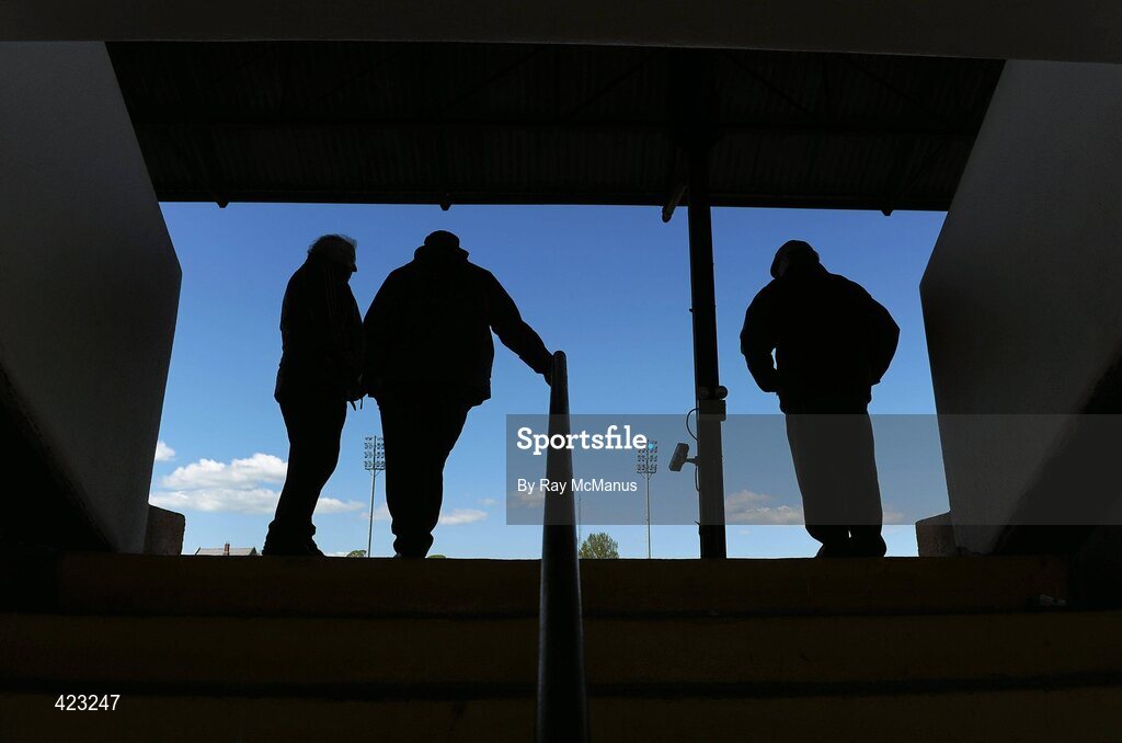 8 May 2010; Spectators Tom Murray, left, from Trim, Co. Meath, Tom Cross, from Sallins, Co. Kildare, and Kevin O'Brien, from Stradbally, Co. Laois are silhouette against the afternoon sun ahead of the game. Christy Ring Cup, Round 1, Meath v Kildare, Pairc Tailteann, Navan, Co. Meath. Picture credit: Ray McManus / SPORTSFILE