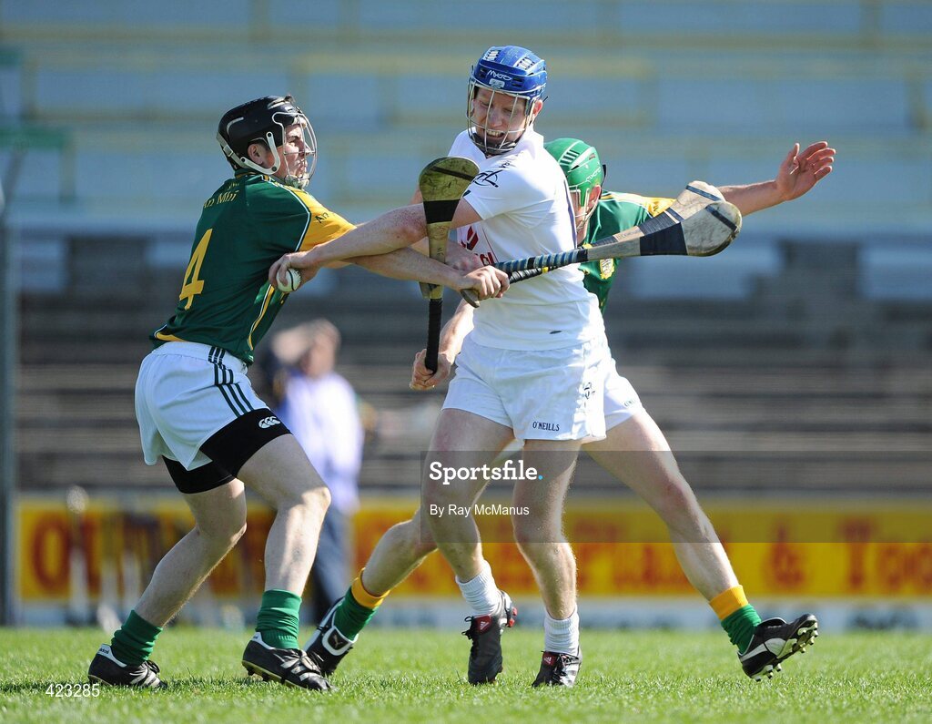 8 May 2010; David Harney, Kildare, in action against David Donoghue, left, and Michael Foley, Meath. Christy Ring Cup, Round 1, Meath v Kildare, Pairc Tailteann, Navan, Co. Meath. Picture credit: Ray McManus / SPORTSFILE