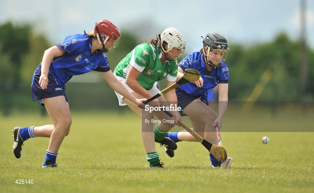 16 May 2010; Aine Lyng and Marie Walsh, Munster, in action against Mary Leacy, Leinster. 2010 Gael Linn Senior Inter-Provincial Championship Camogie Final, Munster v Leinster, Trim GAA Club, Trim, Co. Meath. Picture credit: Barry Cregg / SPORTSFILE
