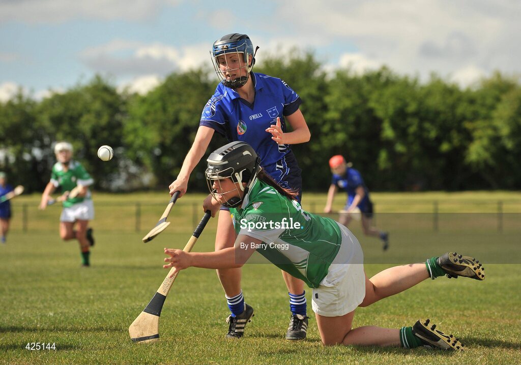 16 May 2010; Jenny Duffy, Munster, in action against Una Leacy, Leinster. 2010 Gael Linn Senior Inter-Provincial Championship Camogie Final, Munster v Leinster, Trim GAA Club, Trim, Co. Meath. Picture credit: Barry Cregg / SPORTSFILE