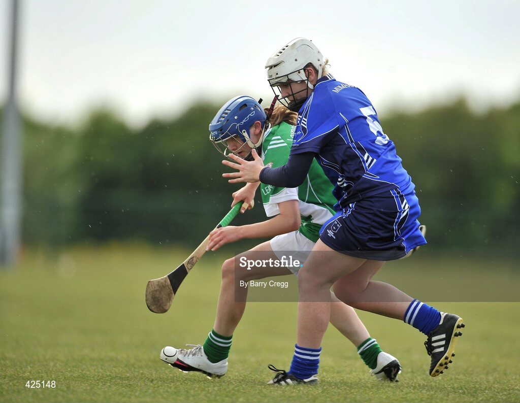 16 May 2010; Mary Ryan, Munster, in action against Michelle Quilty, Leinster. 2010 Gael Linn Senior Inter-Provincial Championship Camogie Final, Munster v Leinster, Trim GAA Club, Trim, Co. Meath. Picture credit: Barry Cregg / SPORTSFILE