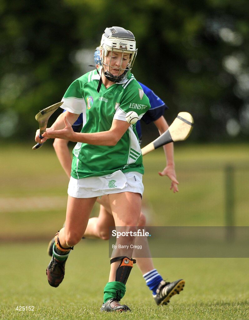 16 May 2010; Kate Kelly, Leinster, in action against Jenny Duffy, Munster. 2010 Gael Linn Senior Inter-Provincial Championship Camogie Final, Munster v Leinster, Trim GAA Club, Trim, Co. Meath. Picture credit: Barry Cregg / SPORTSFILE