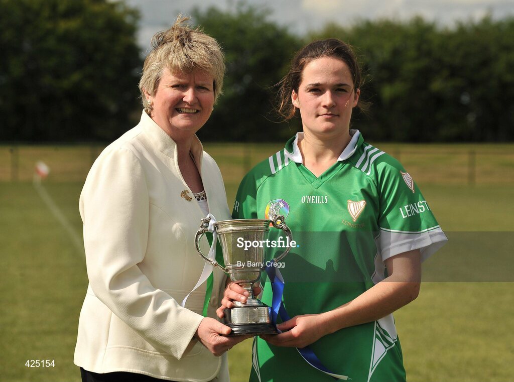 16 May 2010; Ann Dalton, Leinster, receives the the Provincial Cup from Joan Flynn. 2010 Gael Linn Senior Inter-Provincial Championship Camogie Final, Munster v Leinster, Trim GAA Club, Trim, Co. Meath. Picture credit: Barry Cregg / SPORTSFILE