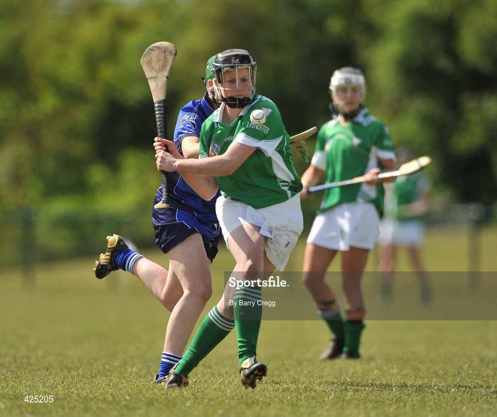 16 May 2010; Katie Power, Leinster, in action against Fiona Lafferty, Munster. 2010 Gael Linn Senior Inter-Provincial Championship Camogie Final, Munster v Leinster, Trim GAA Club, Trim, Co. Meath. Picture credit: Barry Cregg / SPORTSFILE