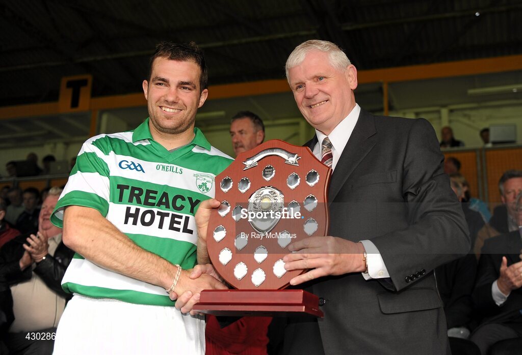 29 May 2010; The Shamrocks captain Mick Weafer is presented with the trophy by Chairman of the Leinster Council Sheamus Howlin. Leinster GAA Club Hurling League Division 2 Final, Shamrocks, Wexford, v Lucan Sarsfields, Dublin, Nowlan Park, Kilkenny. Picture credit: Ray McManus / SPORTSFILE