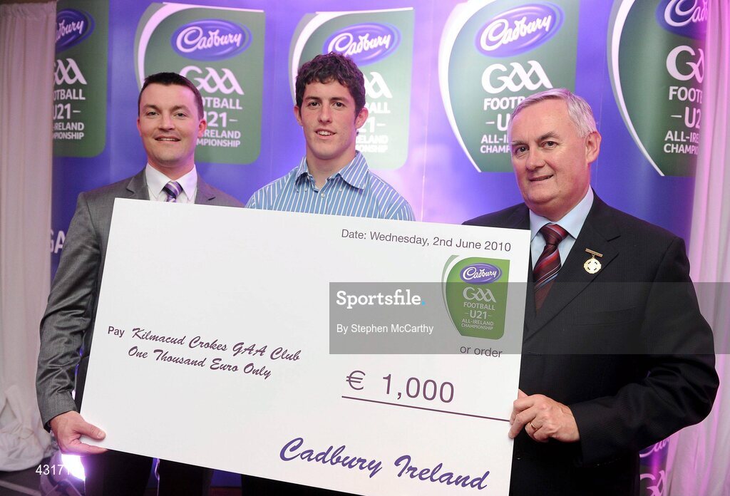 2 June 2010; Uachtarán Chumann Lúthchleas Gael Criostóir Ó Cuana and Shane Guest, Senior Brand Manager, Cadbury Ireland, presenting Dublin footballer Rory O'Carroll, 2010 Cadbury Hero of the Future Award Winner, with a €1,000 cheque for his club, Kilmacud Crokes, as part of his prize. Rory was one of 14 shortlisted players who had excelled throughout the 2010 Cadbury GAA U21 Football Championship, all nominees can be seen on www.cadburygaau21.com Past winners include Colm O’Neill and Fintan Goold from Cork, Killian Young from Kerry and Keith Higgins from Mayo and all have gone on to represent their counties at senior level. Rory, who plays his club football with Kilmacud Crokes, was named as a Cadbury Hero of the Match for his performance against Donegal in the All Ireland Final. The judging panel which consisted of senior Kildare footballer Dermot Earley, former Dublin manager Paul Caffrey and TG4 journalist Michael O’Domhnaill, gave serious consideration to the public vote which saw over 5,000 votes cast on cadburygaau21.com, but ultimately Rory O’Carroll’s heroic performances in both the semi-final against Roscommon and the final against Donegal, where he faced two of the Ireland’s most talented footballers meant he edged the competition out in the end. Cadbury Under 21 Hero of the Future Awards, Croke Park, Dublin. Picture credit: Stephen McCarthy / SPORTSFILE