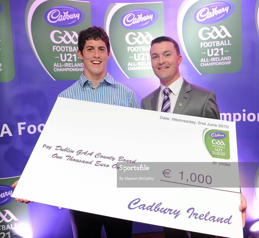 2 June 2010; Shane Guest, Senior Brand Manager, Cadbury Ireland, presenting Dublin footballer Rory O'Carroll, 2010 Cadbury Hero of the Future Award Winner, with a €1,000 cheque for the Dublin GAA County Board, as part of his prize. Rory was one of 14 shortlisted players who had excelled throughout the 2010 Cadbury GAA U21 Football Championship, all nominees can be seen on www.cadburygaau21.com Past winners include Colm O’Neill and Fintan Goold from Cork, Killian Young from Kerry and Keith Higgins from Mayo and all have gone on to represent their counties at senior level. Rory, who plays his club football with Kilmacud Crokes, was named as a Cadbury Hero of the Match for his performance against Donegal in the All Ireland Final. The judging panel which consisted of senior Kildare footballer Dermot Earley, former Dublin manager Paul Caffrey and TG4 journalist Michael O’Domhnaill, gave serious consideration to the public vote which saw over 5,000 votes cast on cadburygaau21.com, but ultimately Rory O’Carroll’s heroic performances in both the semi-final against Roscommon and the final against Donegal, where he faced two of the Ireland’s most talented footballers meant he edged the competition out in the end. Cadbury Under 21 Hero of the Future Awards, Croke Park, Dublin. Picture credit: Stephen McCarthy / SPORTSFILE