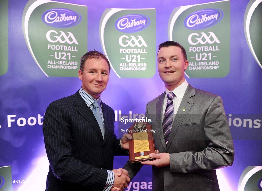 2 June 2010; Shane Guest, Senior Brand Manager, Cadbury Ireland, makes a presentation to Cadbury GAA U21 Football All-Ireland winning Dublin manager Jim Gavin. The 2010 Cadbury Hero of the Future Award was won by Rory O’Carroll, from Dublin. All nominees can be seen on www.cadburygaau21.com. Past winners, Colm O’Neill and Fintan Goold from Cork, Killian Young from Kerry and Keith Higgins from Mayo have gone on to represent their Counties at Senior level. Cadbury Under 21 Hero of the Future Awards, Croke Park, Dublin. Picture credit: Stephen McCarthy / SPORTSFILE
