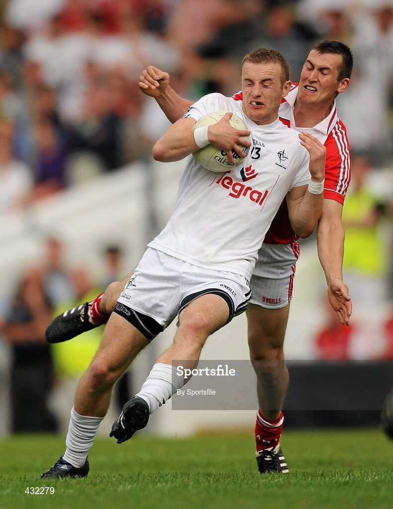 5 June 2010; Alan Smith, Kildare, in action against Dessie Finnegan, Louth. Leinster GAA Football Senior Championship Quarter-Final, Louth v Kildare, Pairc Tailteann, Navan, Co. Meath. Photo by Sportsfile
