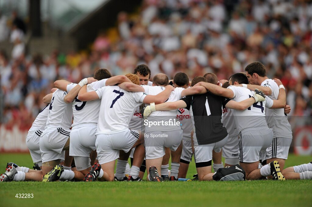 5 June 2010; The Kildare team kneel in a team huddle before the start of the game GAA Football Senior Championship Quarter-Final, Louth v Kildare, Pairc Tailteann, Navan, Co. Meath. Photo by Sportsfile
