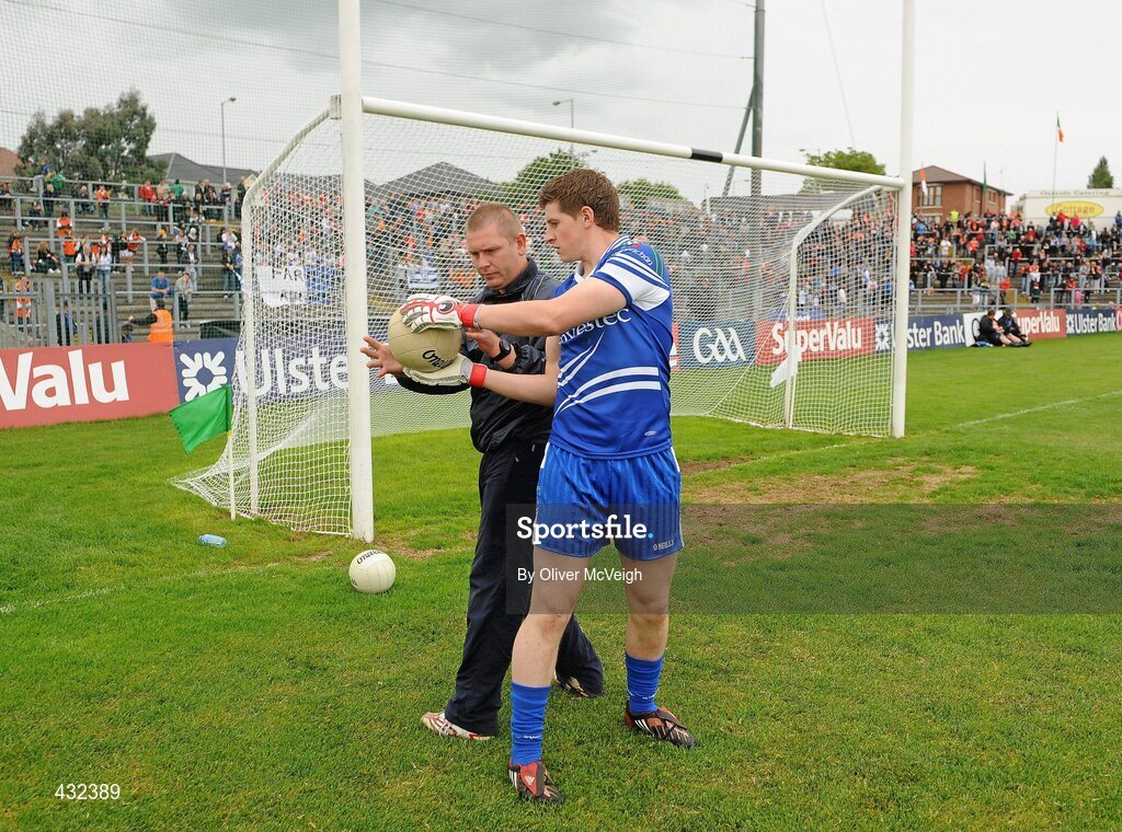 6 June 2010; Former Cavan goalkeeper, Paul O'Dowd, left, now Monaghan goalkeeping coach, issues instructions to stand in Monaghan goalkeeper Darren Hughes, originally picked at full-back, before the game. Ulster GAA Football Senior Championship Quarter-Final, Monaghan v Armagh, Casement Park, Belfast, Co. Antrim. Picture credit: Oliver McVeigh / SPORTSFILE