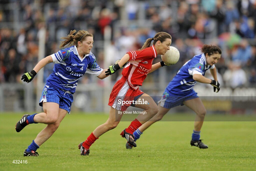 6 June 2010; Orla O'Neill, Tyrone, in action against Aoife McAnespie, Monaghan. TG4 Ulster Ladies Football Senior Championship First Round, Tyrone v Monaghan, Casement Park, Belfast, Co. Antrim. Picture credit: Oliver McVeigh / SPORTSFILE