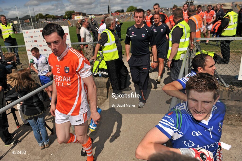 6 June 2010; Monaghan goalkeeper Darren Hughes waits on a TV interview as  Armagh players walk back to their dressing room at the end of the game. Ulster GAA Football Senior Championship Quarter-Final, Monaghan v Armagh, Casement Park, Belfast, Co. Antrim. Picture credit: David Maher / SPORTSFILE