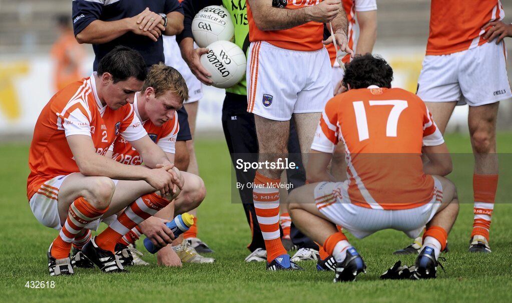 6 June 2010; Dejected Armagh players, from left, Andy Mallon, Kieran Toner and Jamie Clarke, after the game. Ulster GAA Football Senior Championship Quarter-Final, Monaghan v Armagh, Casement Park, Belfast, Co. Antrim. Picture credit: Oliver McVeigh / SPORTSFILE