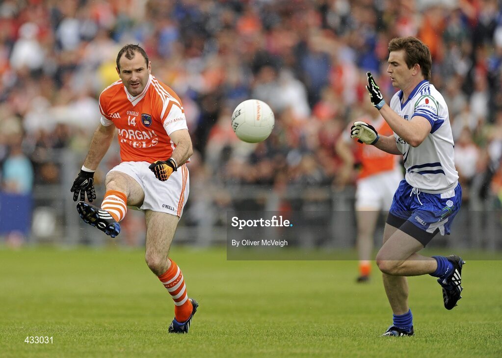 6 June 2010; Steven McDonnell, Armagh, in action against Dessie Mone, Monaghan. Ulster GAA Football Senior Championship Quarter-Final, Monaghan v Armagh, Casement Park, Belfast, Co. Antrim. Picture credit: Oliver McVeigh / SPORTSFILE