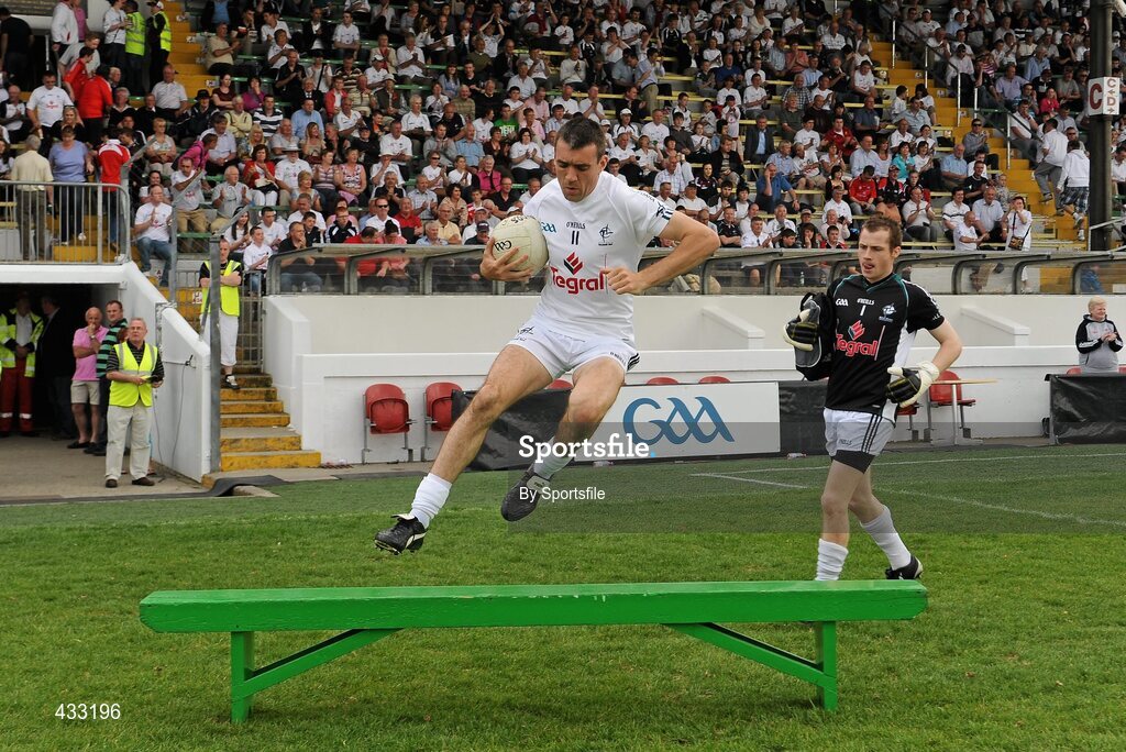 5 June 2010; Kildare's John Doyle jumps the bench prior to the team photograph. Leinster GAA Football Senior Championship Quarter-Final, Louth v Kildare, Pairc Tailteann, Navan, Co. Meath. Photo by Sportsfile