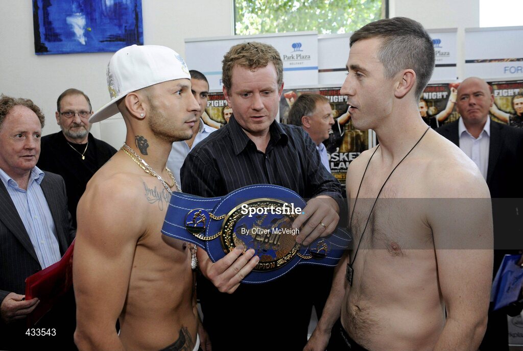 10 June 2010; Promoter Brian Peters, centre, seperates boxers Paul McCloskey, right, and Giuseppe Lauri during the weigh-in ahead of their Yanjing Fight Night European Light Welterweight title bout on Friday night. The Park Plaza Hotel, Aldergrove, Belfast, Co. Antrim. Picture credit: Oliver McVeigh / SPORTSFILE