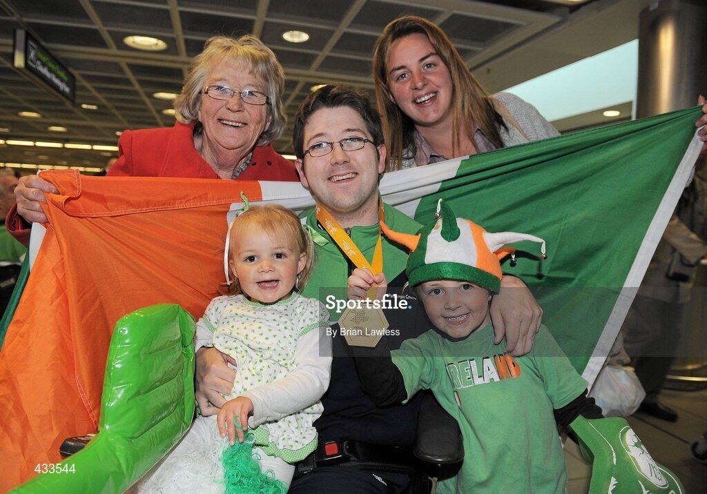 10 June 2010; Padraic Moran, from Bray, Co. Wicklow, celebrates with his mother Catherine Moran, sister Sinead Moran, niece Caoimhe Moran-Laffan, age 3, and nephew Fionn Moran-Laffan, age 5, on his return to Ireland after winning Gold in the BC1 Class at the CPISRA World Boccia Championships in Lisbon. The Bray local, sensationally beat home favourite Portugal’s Joao Paolo Fernandez by a score of 3:2 in a thrilling final at the Estádio Universitário in Lisbon’s University complex to take victory This is the end of a long Championship for Moran who earlier in the week led the Irish team to a 4th place finish in the BC1/BC2 combined team competition. Dublin Airport, Dublin. Picture credit: Brian Lawless / SPORTSFILE
