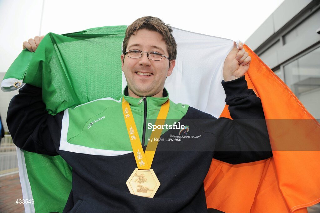 10 June 2010; Padraic Moran, from Bray, Co. Wicklow, celebrates on his return to Ireland after winning Gold in the BC1 Class at the CPISRA World Boccia Championships in Lisbon. The Bray local, sensationally beat home favourite Portugal’s Joao Paolo Fernandez by a score of 3:2 in a thrilling final at the Estádio Universitário in Lisbon’s University complex to take victory This is the end of a long Championship for Moran who earlier in the week led the Irish team to a 4th place finish in the BC1/BC2 combined team competition. Dublin Airport, Dublin. Picture credit: Brian Lawless / SPORTSFILE