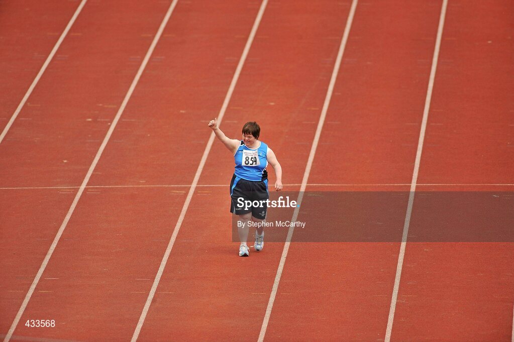 10 June 2010; Mary Duffy, from Moore Abby, Kildare, salutes the crowd during her athletics divisioning event at the 2010 Special Olympics Ireland Games. University of Limerick, Limerick. Picture credit: Stephen McCarthy / SPORTSFILE