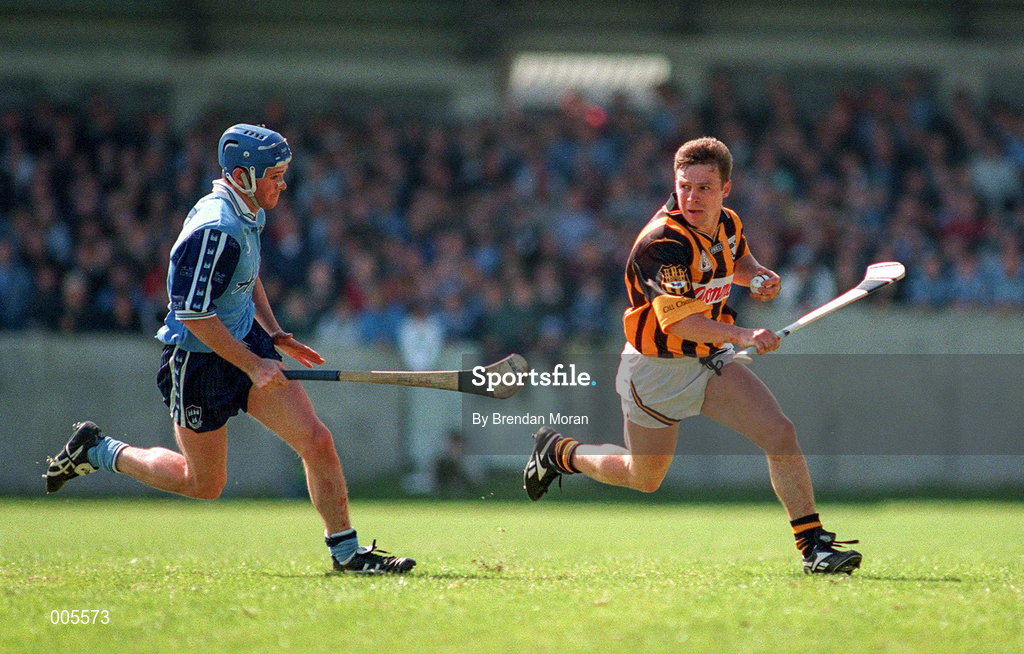 31 May 1998; Charlie Carter of Kilkenny races clear of John Finnegan of Dublin during the Leinster GAA Hurling Senior Championship Quarter-Final match between Dublin and Kilkenny at Parnell Park in Dublin. Photo by Brendan Moran/Sportsfile
