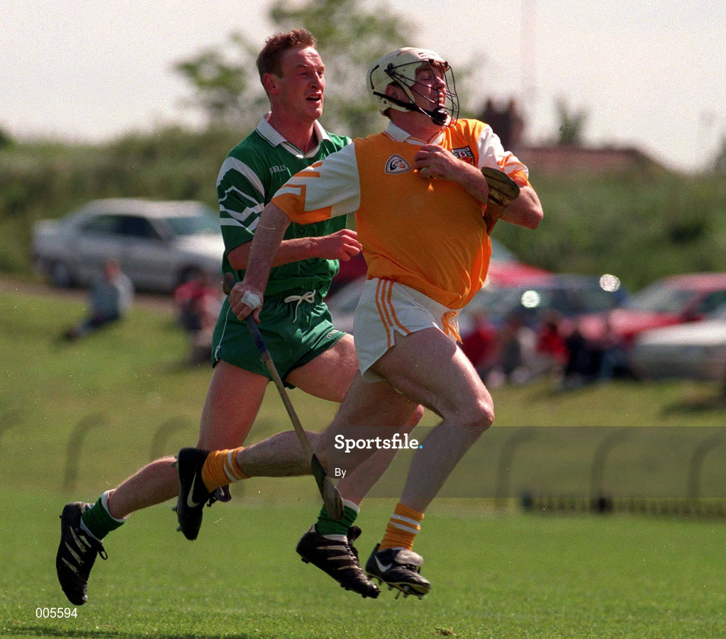 14 June 1998.Colm McGuckian Antrim in action against Pat Jordan London, Ulster Hurling Championship, Casement Park. Picture Credit: Damien Eagers/SPORTSFILE.
