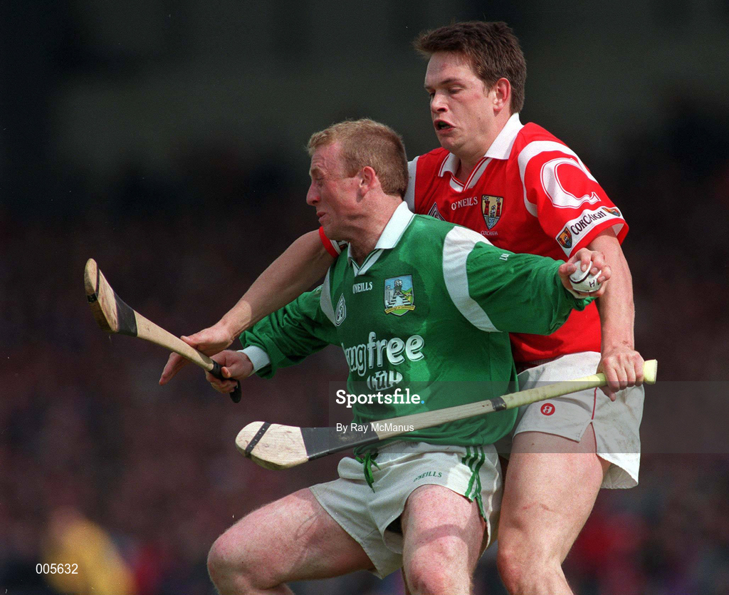 31 May 1998; Dave Clarke of Limerick in action against Alan Browne of Cork during the Munster Senior Hurling Championship Quarter-Final match between Limerick and Cork at the Gaelic Grounds in Limerick. Photo by Ray McManus/Sportsfile