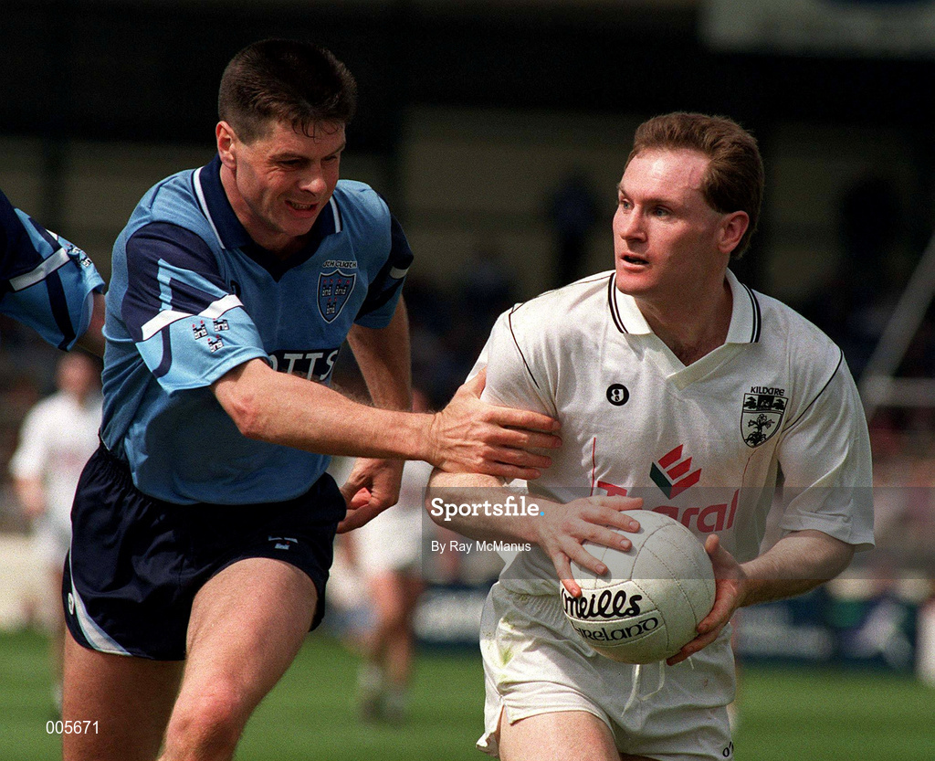 18 June 1994; Declan Kerrigan of Kildare breaks free from Paddy Moran of Dublin during the Leinster Senior Football Championship Quarter-Final match between Dublin and Kildare at Croke Park in Dublin. Photo by Ray McManus/Sportsfile