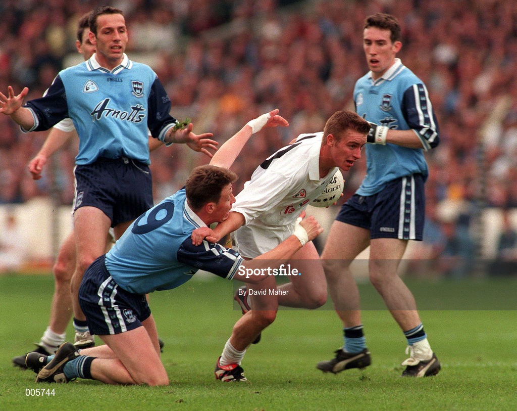 7 June 1998; Eddie McCormack of Kildare attempts to get away from Paul Bealin of Dublin as Ian Robertson and Dermot Harrington of Dublin look on during the Leinster Senior Football Championship Quarter-Final match between Dublin and Kildare at Croke Park in Dublin. Photo by David Maher/Sportsfile