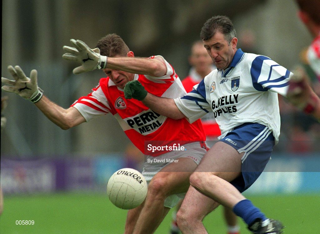 31 May 1998; Anthony Tohill of Derry attempts to block Gerard McGuirk of Monaghan during the Ulster GAA Football Senior Championship Quarter-Final match between Derry and Monaghan at Celtic Park in Derry. Photo by David Maher/Sportsfile