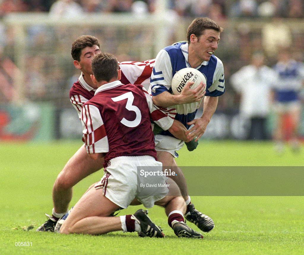 7 June 1998; Ian Fitzgerald of Laois in action against David Murphy, 3, and Aidan Canning of Westmeath during the Leinster Senior Football Championship Quarter-Final match between Laois and Westmeath at Croke Park in Dublin. Photo by David Maher/Sportsfile