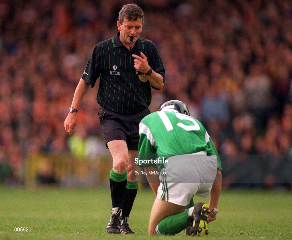 31 May 1998; Referee Johnny McDonnell pictured with Damien Quigley of Limerick during the Munster Senior Hurling Championship Quarter-Final match between Limerick and Cork at the Gaelic Grounds in Limerick. Photo by Ray McManus/Sportsfile
